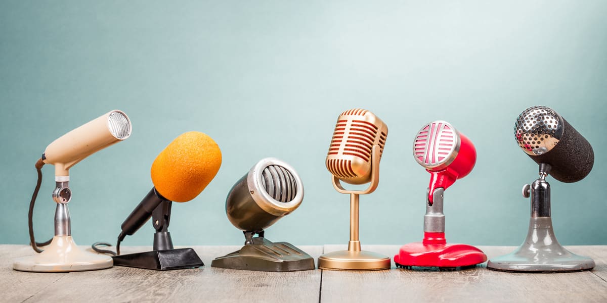 Communication: Historical microphones on the table - netzwerk managementberatung | coaching
